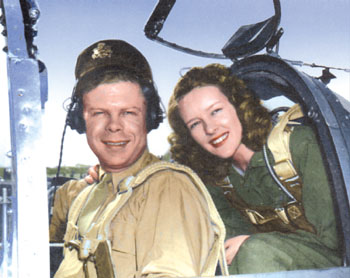 Marge Bong riding piggy -back with husband Dick Bong in a Lockheed P-38 fighter